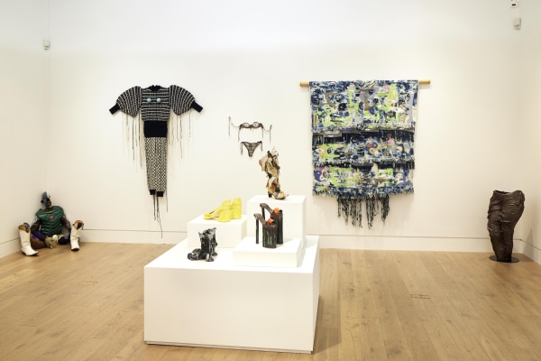 Gray Wielebinski, Coco Crampton, Leo Costelloe, Zadie Xa and Jala Wahid (left to right on wall); Lindsey Mendick, Sandra Lane, Tenant of Culture and Paloma Proudfoot (bottom left to right clockwise on plinth)