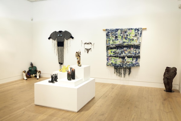Gray Wielebinski, Coco Crampton, Leo Costelloe, Zadie Xa and Jala Wahid (left to right on wall); Lindsey Mendick, Sandra Lane, Tenant of Culture and Paloma Proudfoot (bottom left to right clockwise on plinth)
