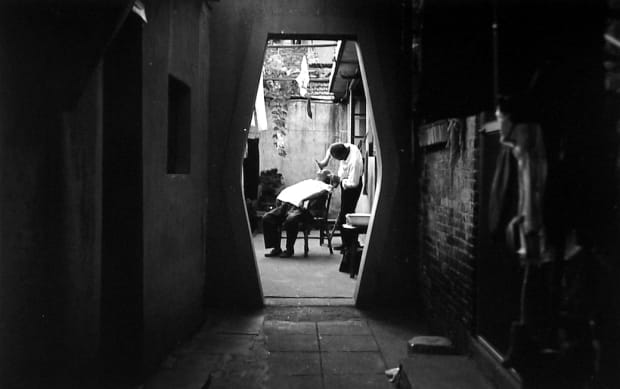 Larry Silver (b. 1934) Man Being Shaved, 1996 Signed on verso Gelatin silver print 16 x 20 in (40.6 x...