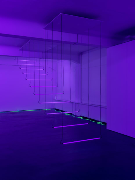 With Light Steps (1990) Brigitte Kowanz creates a space-related and adaptable black light installation, here consisting of eleven black light...