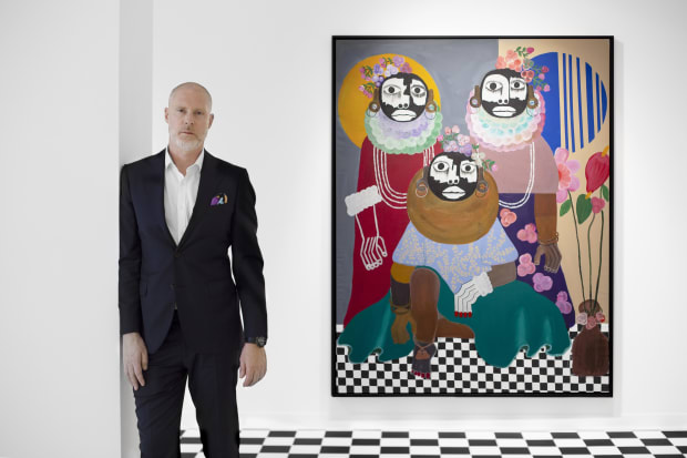 Image shows Founder Jean David Malat standing in his gallery