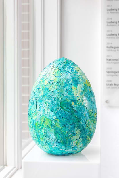 Hand-painted vases and sculptural forms are sprinkled throughout the exhibition in a variety of colors, neutrals, and fresh whites. These...