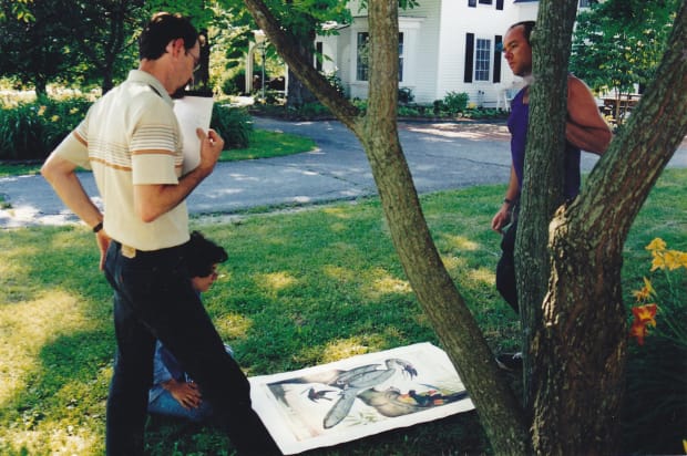 Walton Ford with Peter Pettengill studying a proof of Swadeshi-cide. Photo credit: Paul Kasmin
