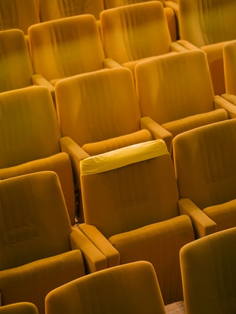 yellow photograph of armchairs.