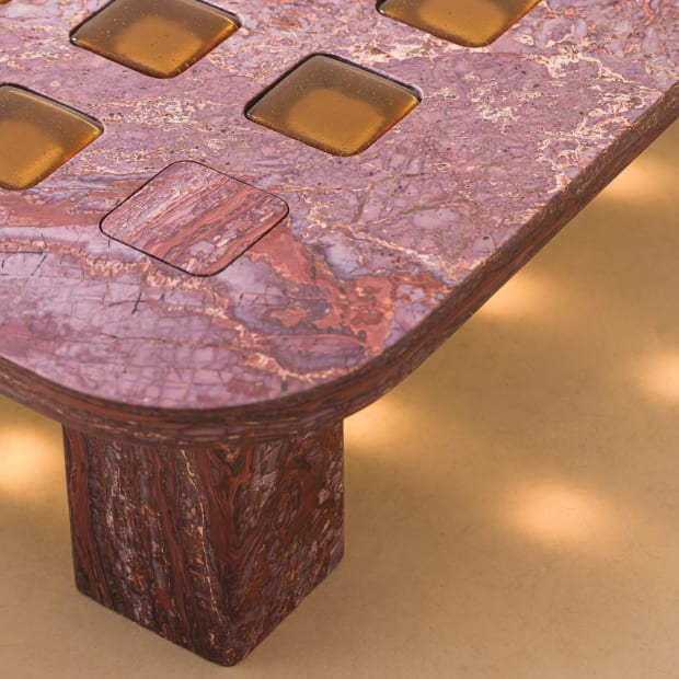 Janela's collection features sideboards, coffee tables, and dining tables sculpted from solid, rare Brazilian quartzites, complemented by glass inserts. Each...