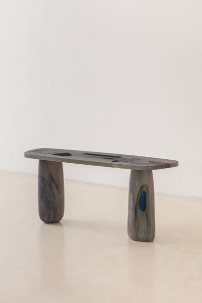 JANELAS COLLECTION Janela&rsquo;s collection features sideboards, coffee tables, and dining tables sculpted from solid, rare Brazilian quartzites, complemented by glass...