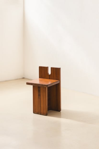 The Sesc Stool is structured with only four thick rectangular blocks of plywood pine, different from the traditional thin layers...