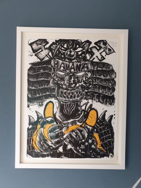 Young Art fan Daniël showing his specially signed Litho by Lieuwe in his room.