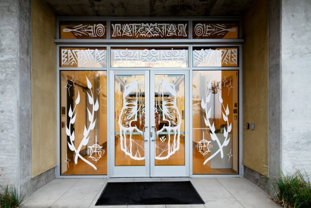 glass doors decorated in white illustrations by GATS