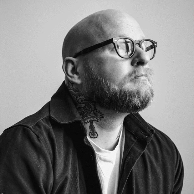 Black and white portrait of artist Chris Austin