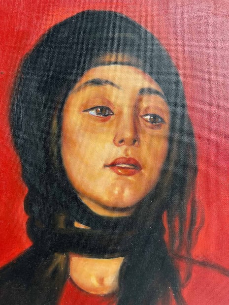 Close-up of "The Red Gaze" painting, oil on canvas, featuring a contemplative figure with a dark headscarf against a vivid red background, showcasing rich cultural elements and expressive brushwork.