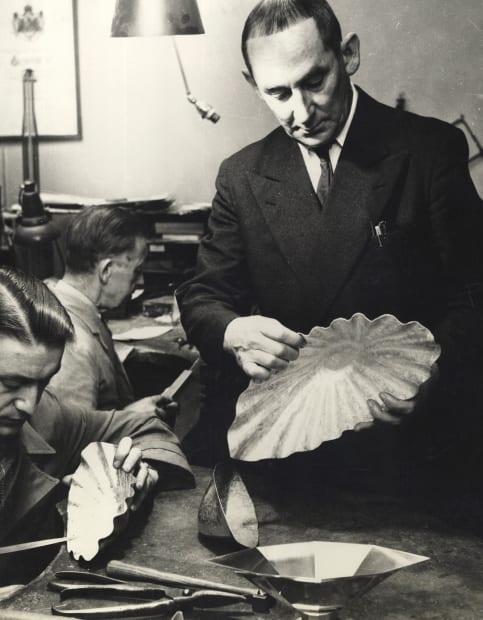 Wiwen Nilsson holding what will become the octagonal bowl in the foreground, 1953.