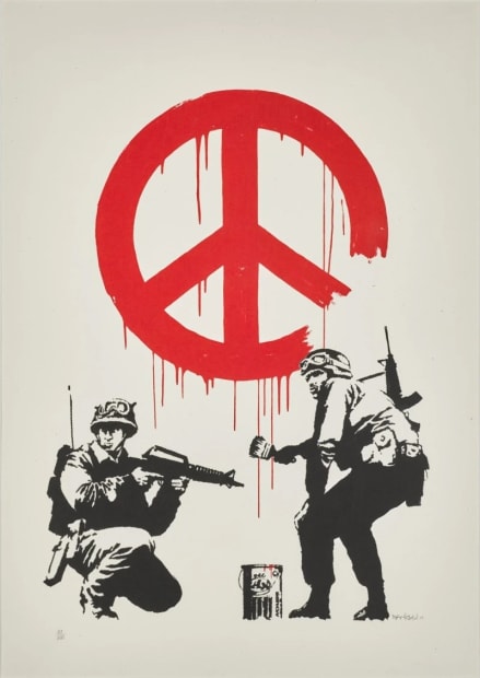Banksy’s 2005 CND Soldiers praying by peace symbol, anti-war street art edition.