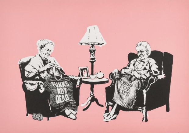 Banksy’s 2006 Grannies knitting subversive slogans, ironic take on tradition.