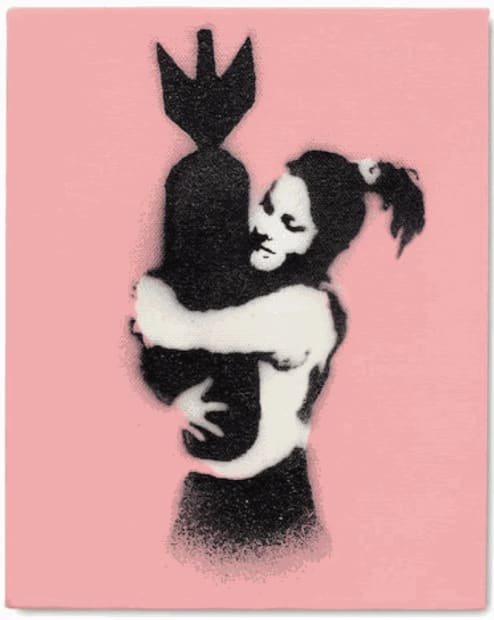 Banksy’s 2002 Bomb Love girl hugs missile lovingly, classic anti-war street art piece.