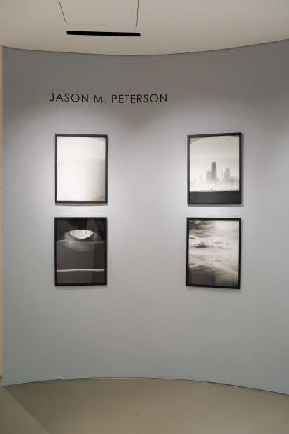 Jason M. Peterson spotlight showcasing his high contrast, minimalistic photography at Lenox Square contemporary art gallery located next to Gucci.