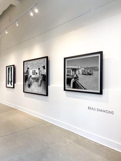 Spotlit Beau Simmons night-ranch photograph in black and white at Buckhead Village fine art gallery.