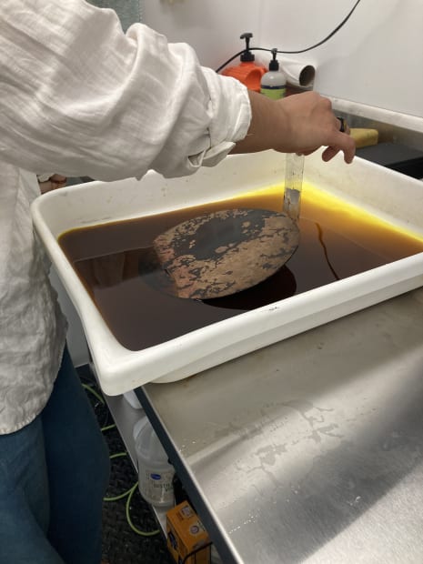 In cuerpo, rich raw sienna blends with earthy purple inks to reveal the activity of making itself: the process of...