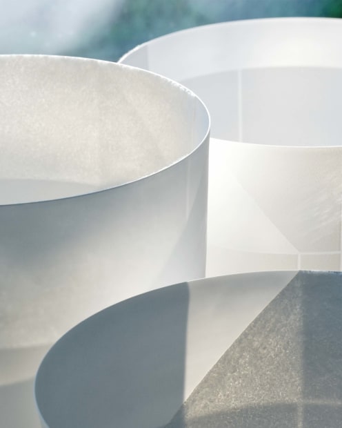 When natural light passes through translucent white porcelain, placed near a window, it never manifests in the same way twice....