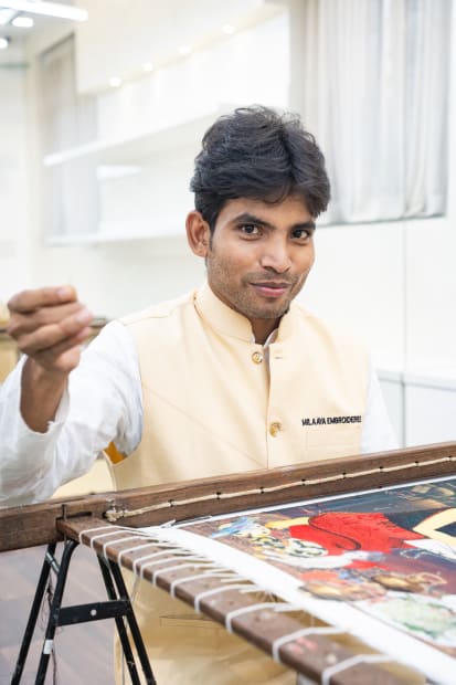 Artisans Weaving Narratives in Thread