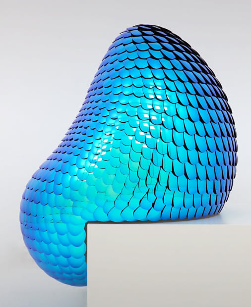 The Habitat creatures crawling on a pedestal almost seem to come to life. Their organic shapes twist and bend, as...