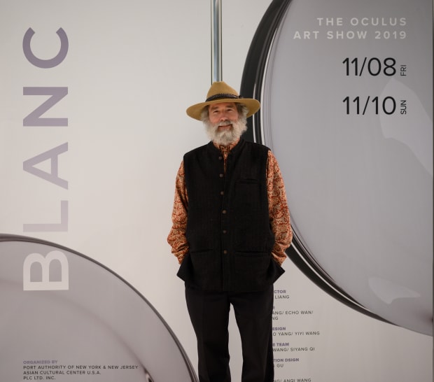 Image of artist Thomas Easley with his signature beard, Stetson hat and vest