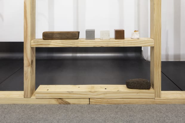 fig 45.03 metablock, 2024 wood, cement, copper, quartz, volcanic rock, steel, leather wood block 20 x 4 x 4.5cm (7.8...