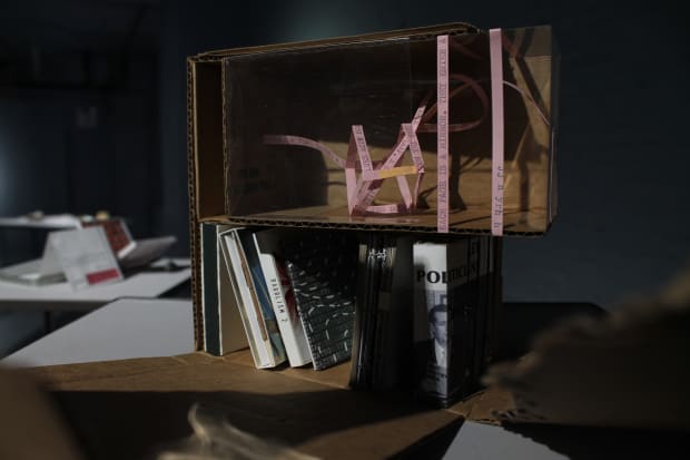 Higa’s tiny zines are a series of books no larger than 2.5 by 1.5 inches. They question the effects of...