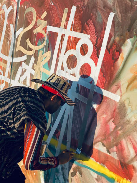 RETNA (Marquis Duriel Lewis), the internationally renowned street artist whose signature hieroglyphics are highly coveted by collectors on both sides...