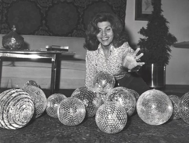 According to curator Suzanne Cotter, Monir’s mirror balls “point to her experimentation with the possibilities of mirror work as sculpture....