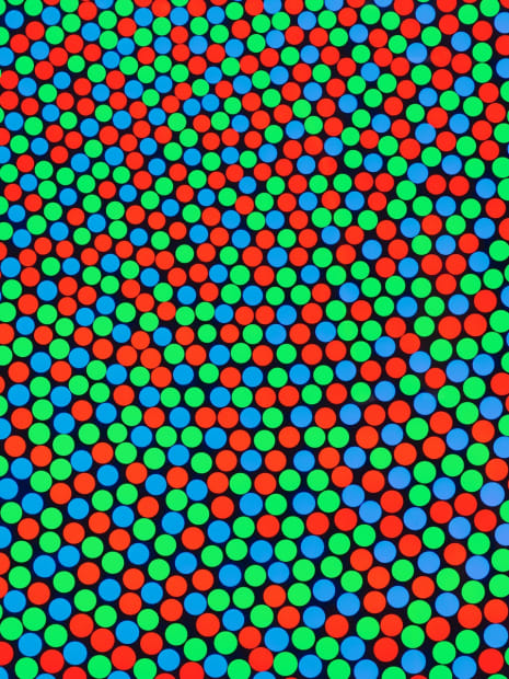 An arrangement of red, blue, and green dots–the only colors that human eyes are sensitive to–mix to generate white light....