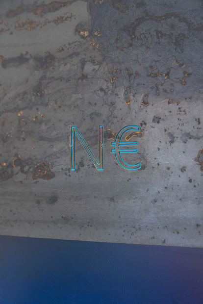 The wall sculpture Cryptic Machine Prototype A (2018) by the artist Niko Abramidis &NE reflects his constant preoccupation with economic...