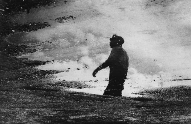 Dan Budnik, Selma to Montgomery March, Martin Luther King, JR. Reflected in a Rain Puddle, Montgomery County, Alabama, March 24th,...
