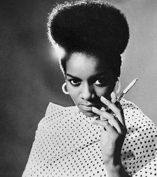 “Priscilla Bardonille’s massive Afro puff was an ‘Amharic hairstyle’ from the north-central region of Ethiopia. Grandassa called this blend of...