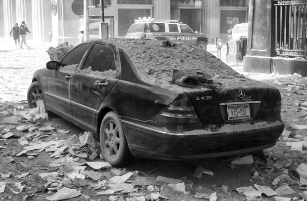 Again the debris was coming down around us. I Saw a good friend of mine Jason a fellow photographer covered...