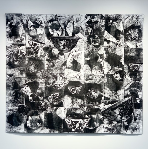 This quilt is composed of some twenty-odd black and white images of the Chinese ceramic bowl at the heart of this exhibit. In 2016, on returning from exhibiting her work in China, the artist received the patterned bowl wrapped in layers of Chinese-languag