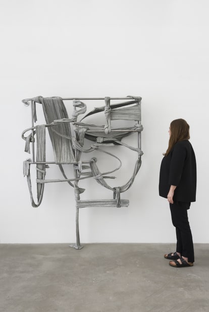 Nikita Gale sculpture mounted to wall with scale