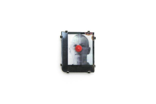 Bernhard Schobinger, Self-Portrait with Nose, 2010, Brooch, Digital photograph on commuter card, hologram, silver, coral