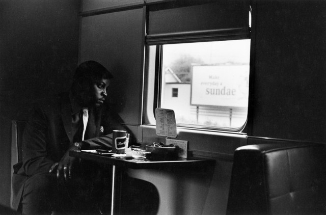 Ian MacEachern 1942- Man in the Bar Car, Between London and Windsor, ON, 1969 Signed, titled and dated, in pencil, annotated "NFB-70-776", in ink, au verso Printed in 1973 image on 11 x 14 inch (27.94 x 35.56 cm) Gelatin silver paper Flush mounted to period board 7 1/4 x 11 in 18.42 x 27.94 cm