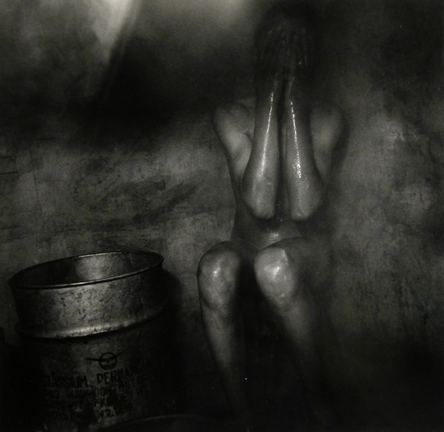 Ruth Kaplan b. 1955Hamam, Gliz, Morocco [woman covering her face], 2002 Signed, titled, dated, and editioned, in pencil, au verso image on 16 x 20 inch (40.64 x 50.80 cm) Gelatin silver paper 14 1/4 x 14 1/4 in 36.2 x 36.2 cm Edition of 20