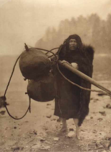 Edward Sheriff Curtis 1868-1952 The Whaler, Makah, 1915 From the book "North American Indian" Titled with photogravure printer and plate number 395 as part of printing plate, in ink, au recto Printed 1919 Photogravure on paper 21 ¾ x 17 ¾ inch (55.25 x 45.09 cm)