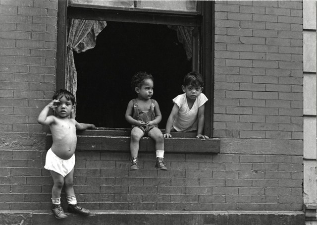 Helen Levitt 1913-2009 Children Playing at Window, 1942 Signed, in pencil, au verso Printed circa 1942 Illustrated on page 24 of "Here and There", by Helen Levitt and Adam Gopnik Gelatin silver print 6 ¼ x 9 inch (15.88 x 22.86 cm)