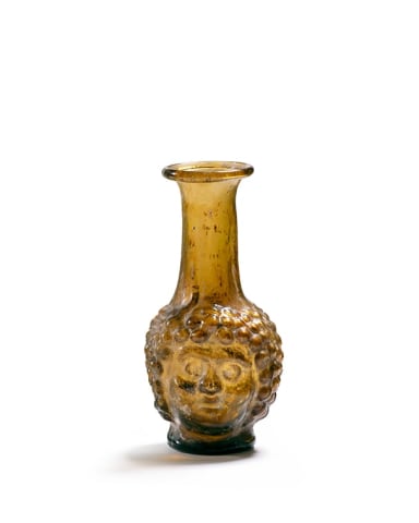 89. Roman janus-headed flask, c.2nd century AD