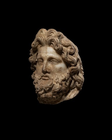 Roman head of a bearded god, c.2nd century AD