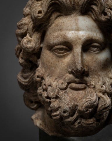 Roman head of a bearded god, c.2nd century AD