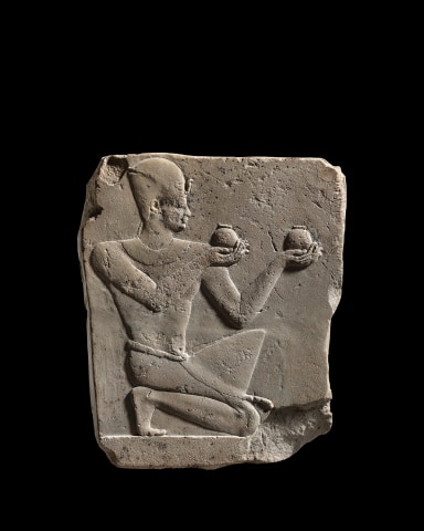 Egyptian sculptor's trial piece of a kneeling pharaoh, Ptolemaic Period, c.334-30 BC