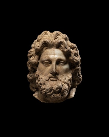 Roman head of a bearded god, c.2nd century AD