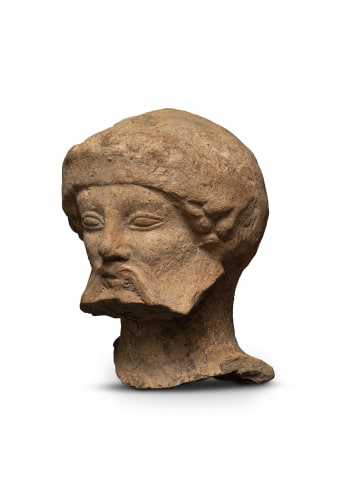 Greek head of a bearded male, South Italy, Medma, second quarter of the 5th century BC
