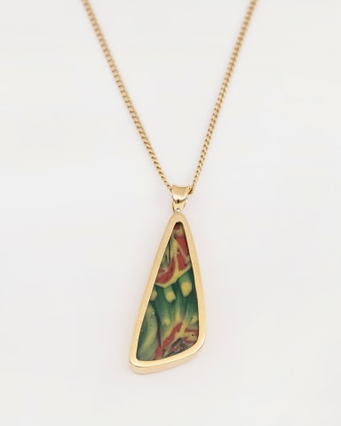 175. Roman glass fragment pendant, c. late 1st century BC-early 1st century AD