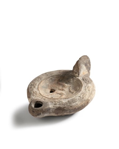 38. Roman lamp with Diana, North Africa, c.175-225 AD